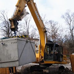 a1 pumping and repair installing septic tank  concreat in Covington GA.